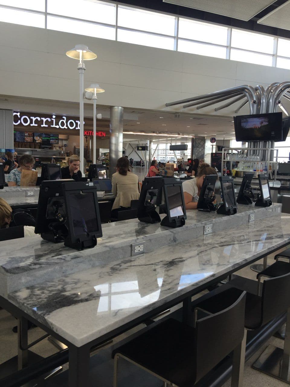 Gallery photos for Tech-Savvy Seating Enhancements at Metro Detroit Airport: Image #1